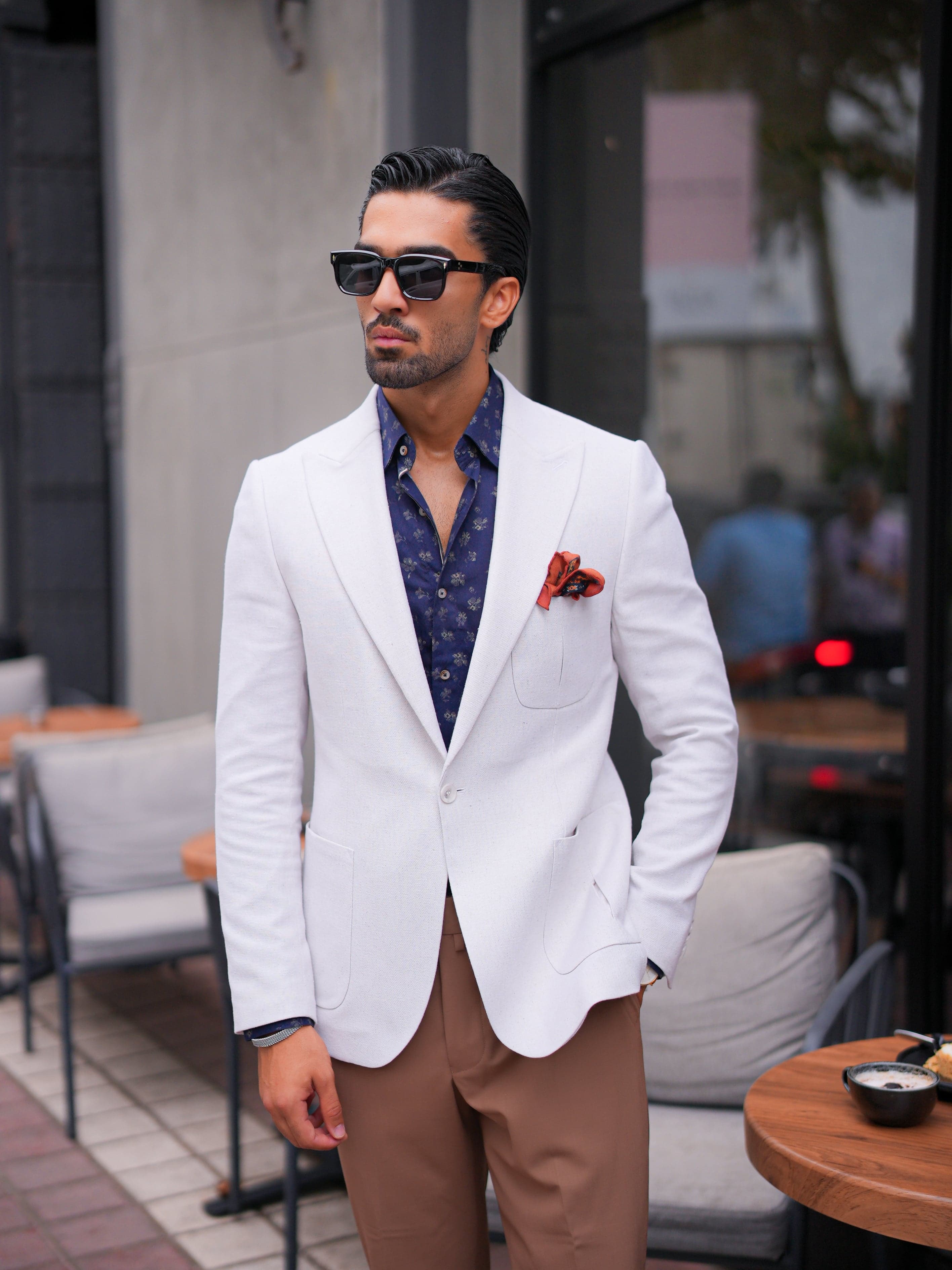 Three-piece suit featuring waistcoat and structured shoulders