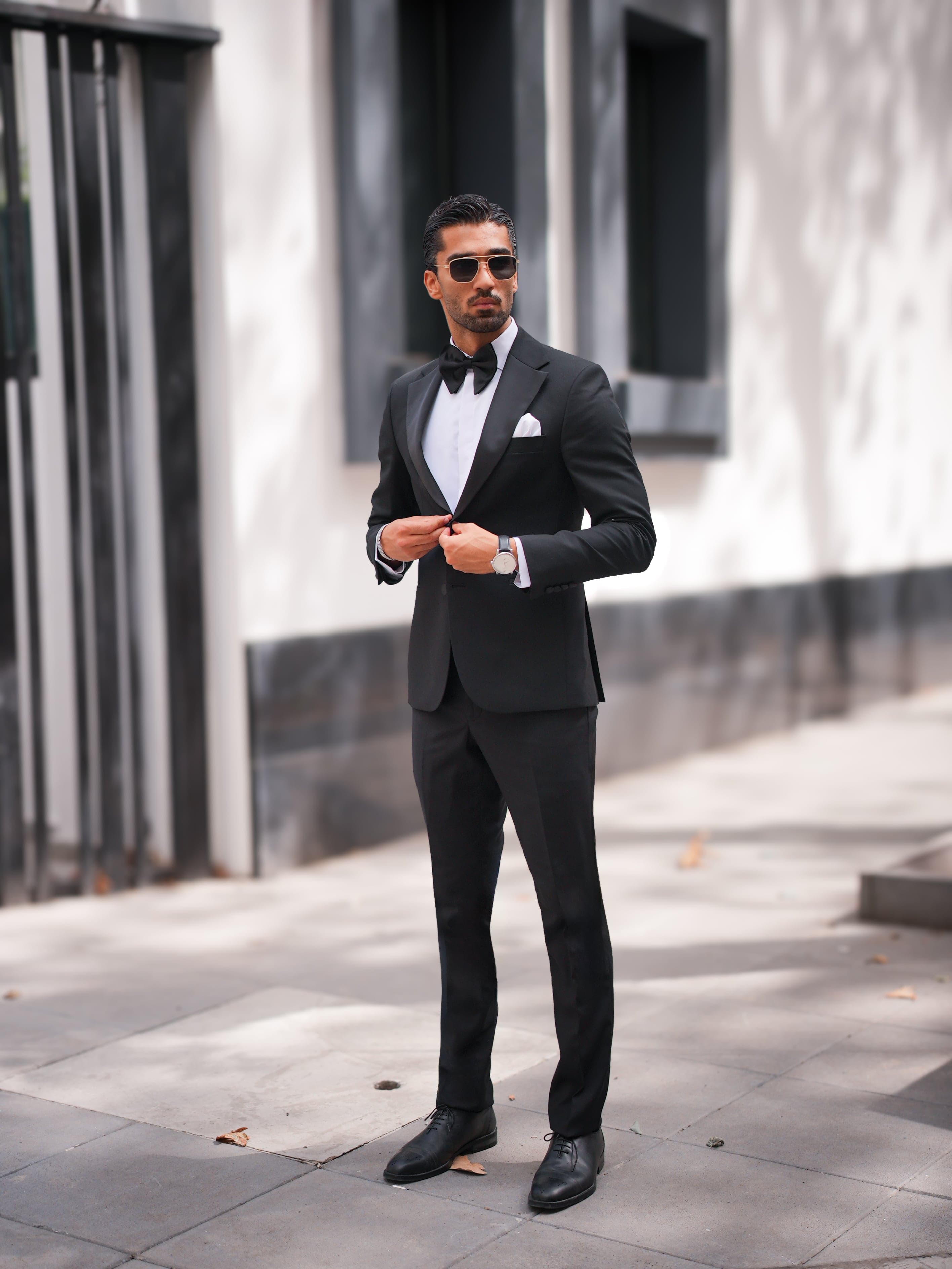 Slim-cut navy suit with subtle texture