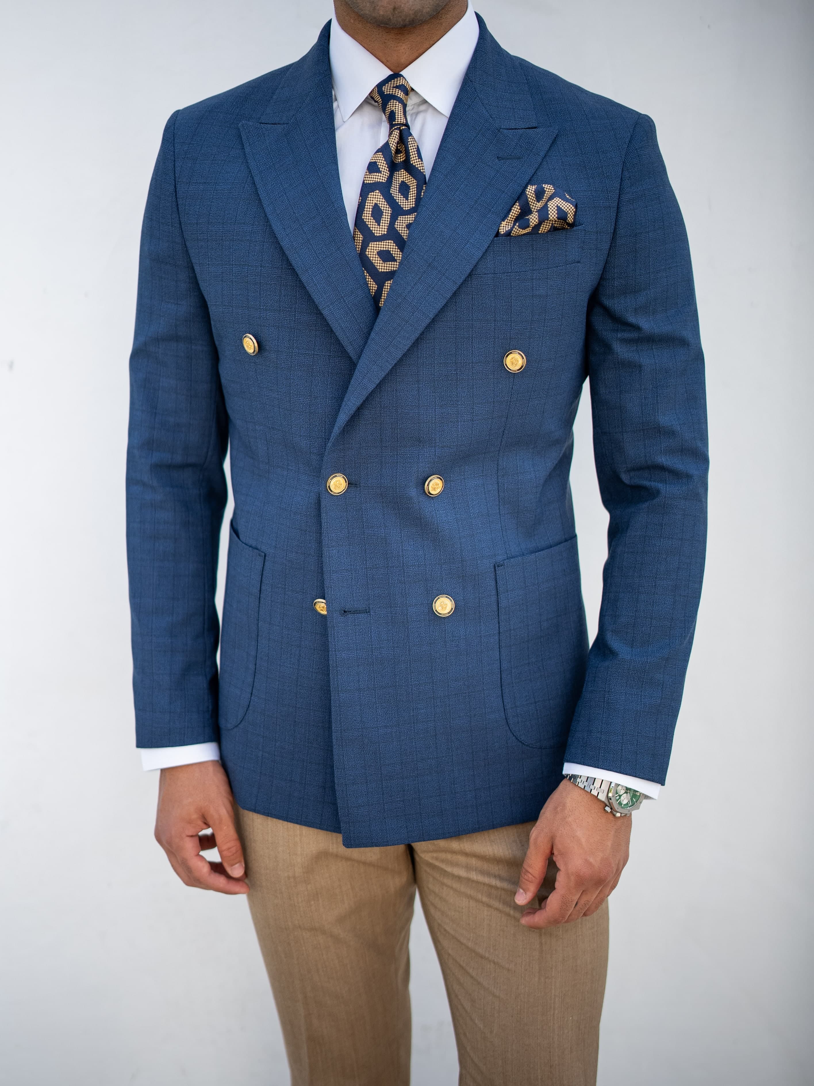 Dark tuxedo with sharp tailoring and elegant finish